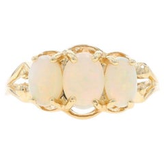 Yellow Gold Opal Three-Stone Ring - 10k Oval Cabochon .82ctw