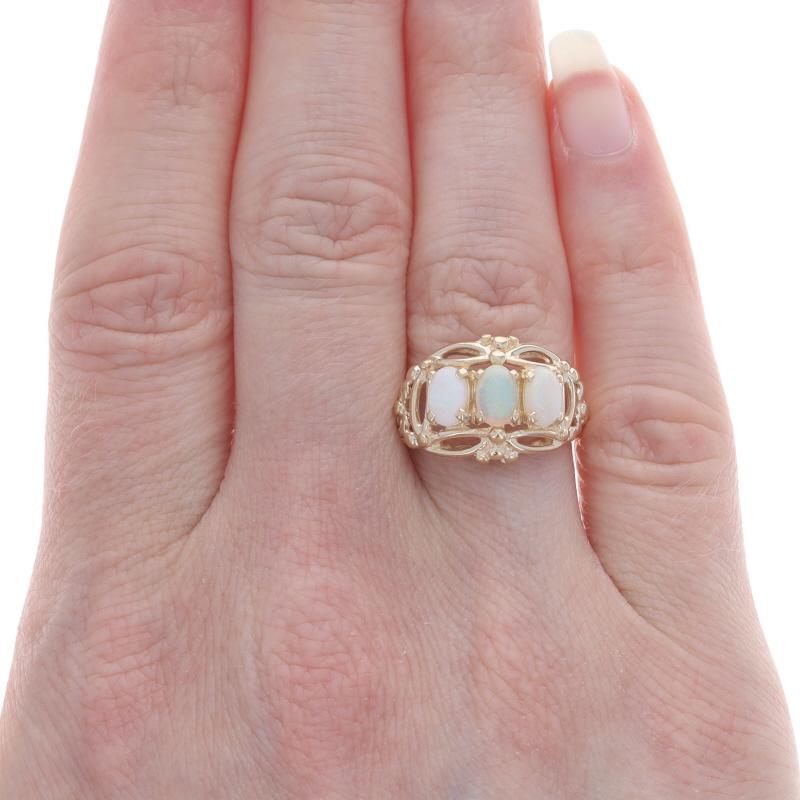 Oval Cut Yellow Gold Opal Three-Stone Ring - 14k Oval Cabochon .63ctw For Sale