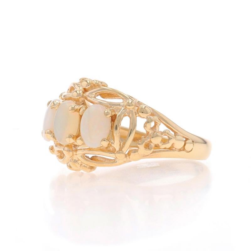 Yellow Gold Opal Three-Stone Ring - 14k Oval Cabochon .63ctw In Excellent Condition For Sale In Greensboro, NC