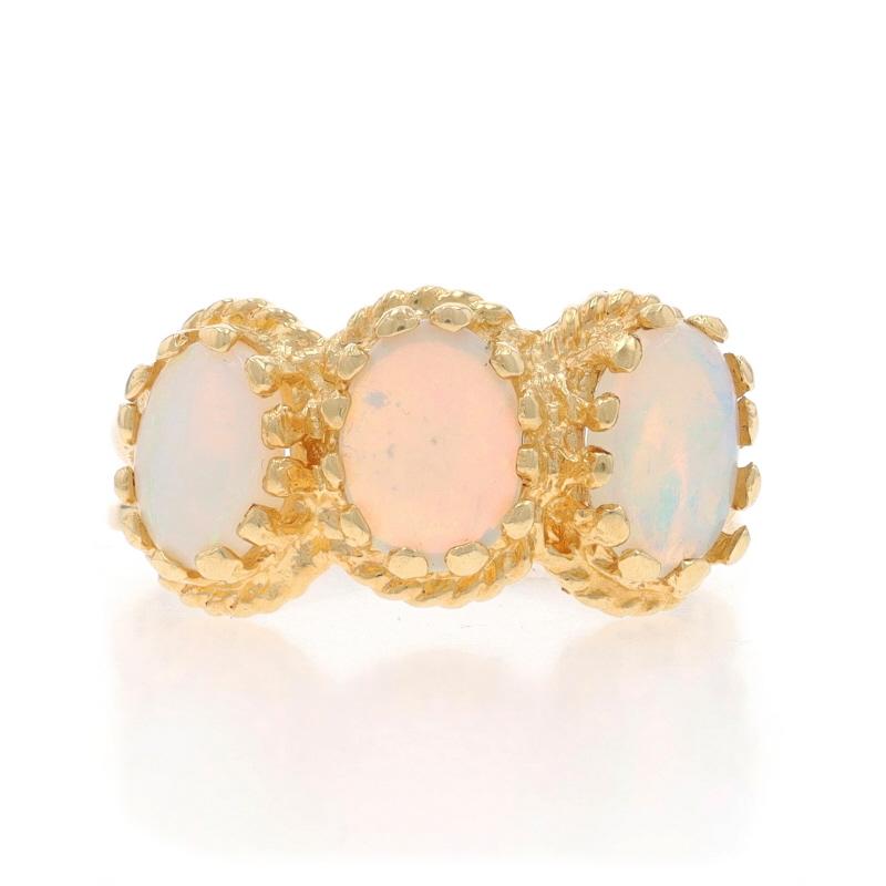 Size: 6
Sizing Fee: Up 1 1/2 sizes for $35 or Down 1/2 a size for $35

Metal Content: 14k Yellow Gold

Stone Information

Natural Opals
Carat(s): .96ctw
Cut: Oval Cabochon
Origin: Australian

Total Carats: .96ctw

Style: Three-Stone
Features: Split