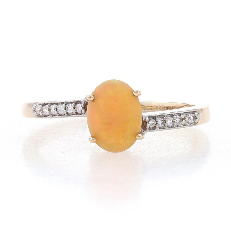Size: 8
Sizing Fee: Up 2 sizes for $35

Metal Content: 10k Yellow Gold & 10k White Gold

Stone Information
Natural Opal
Carat(s): .78ct
Cut: Oval
Stone Note: Ethiopian

Natural Zircons
Carat(s): .24ctw
Cut: Round
Color: White

Total Carats: