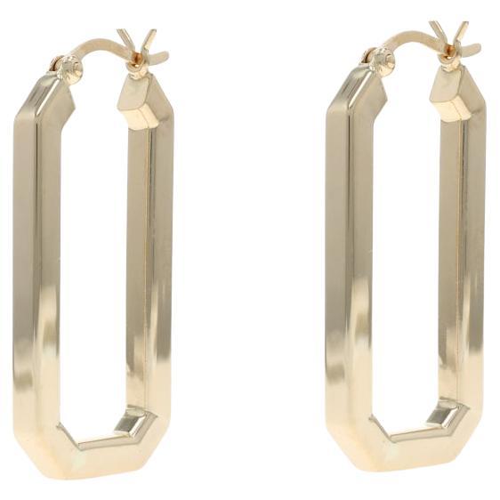 Orecchini a cerchio ovali in oro giallo - 14k