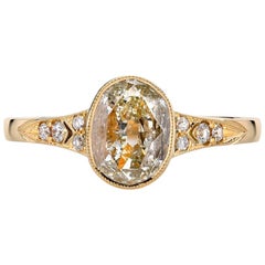 1.08 Carat Oval Cut Diamond Set in a Handcrafted Gold Engagement Ring