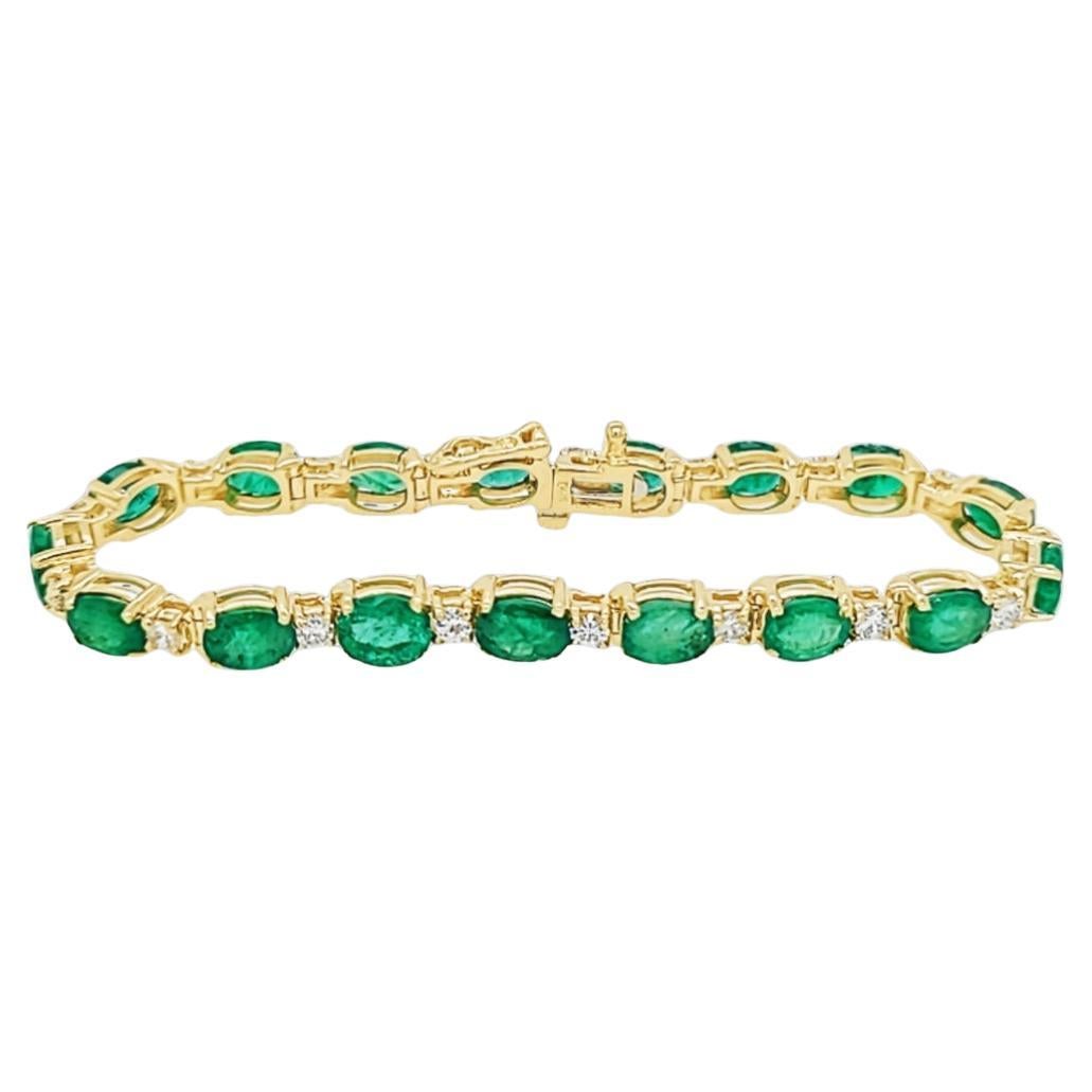 Yellow Gold Oval Emerald and Diamond Line Bracelet For Sale