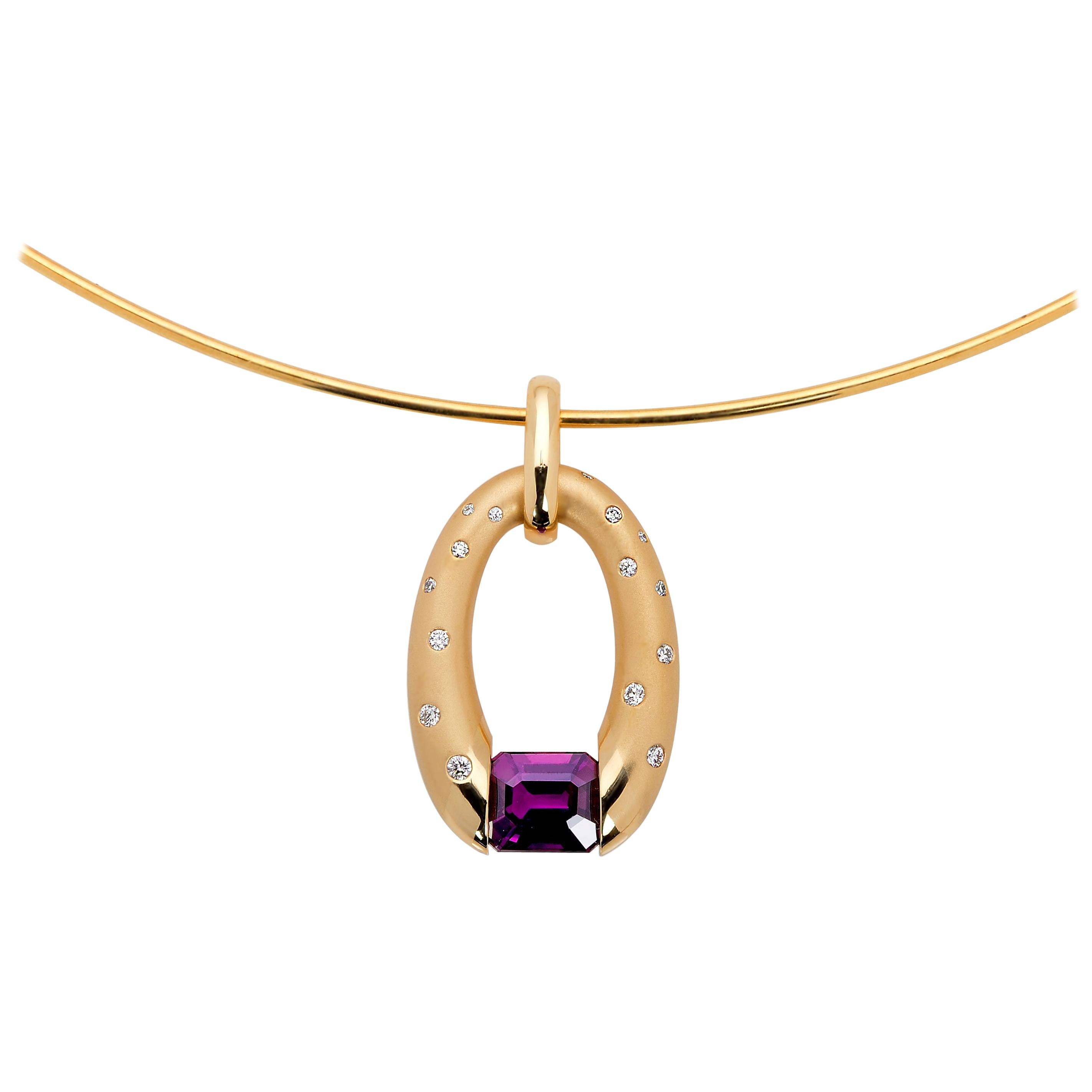 Yellow Gold Oval Pendant with Tension-Set Magenta Sapphire For Sale