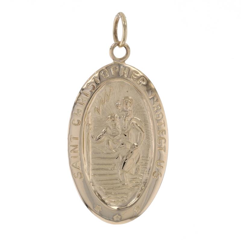 Metal Content: 14k Yellow Gold

Style: Faith Medal
Theme: Saint Christopher, Protection 
Features: Engravable Back

Measurements
Tall (from stationary bail): 1 3/32