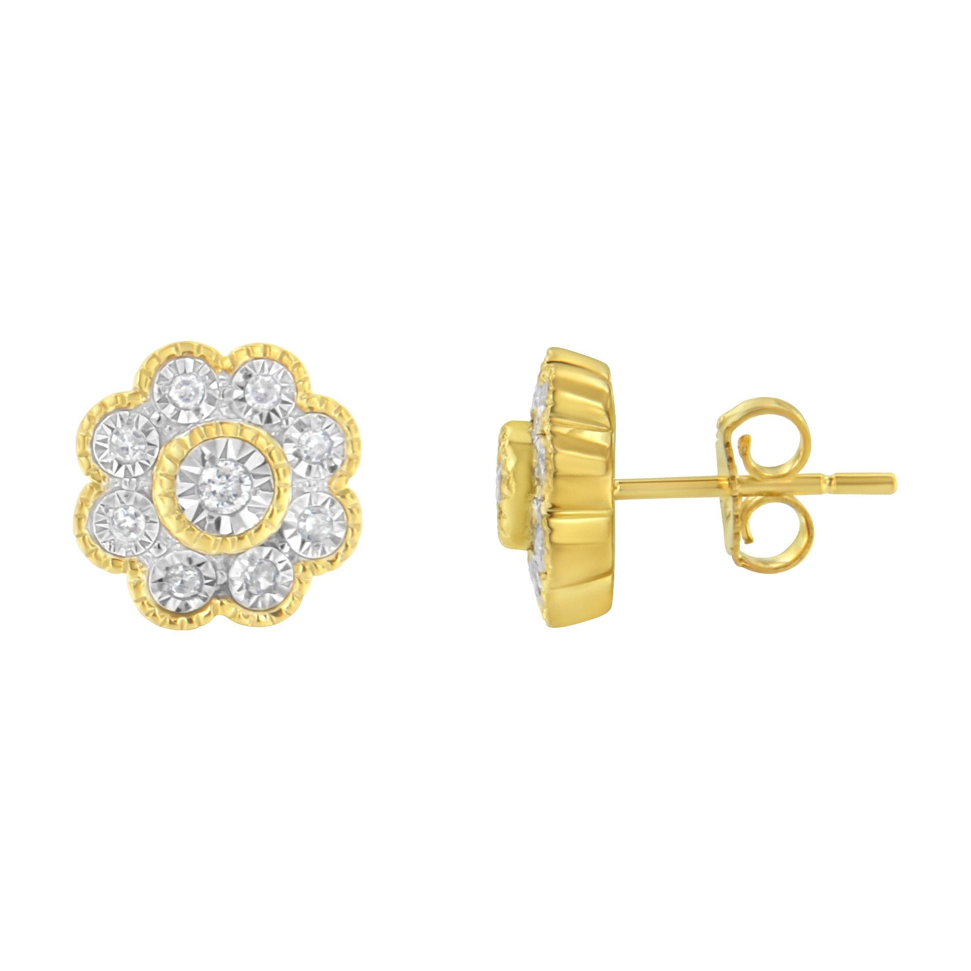 Beautiful and elegant, these 14k yellow gold plated sterling silver stud earrings feature a nature inspired design. Miracle set diamonds are arranged to create a floral design. A yellow gold beaded ribbon wraps around the central diamond as well as