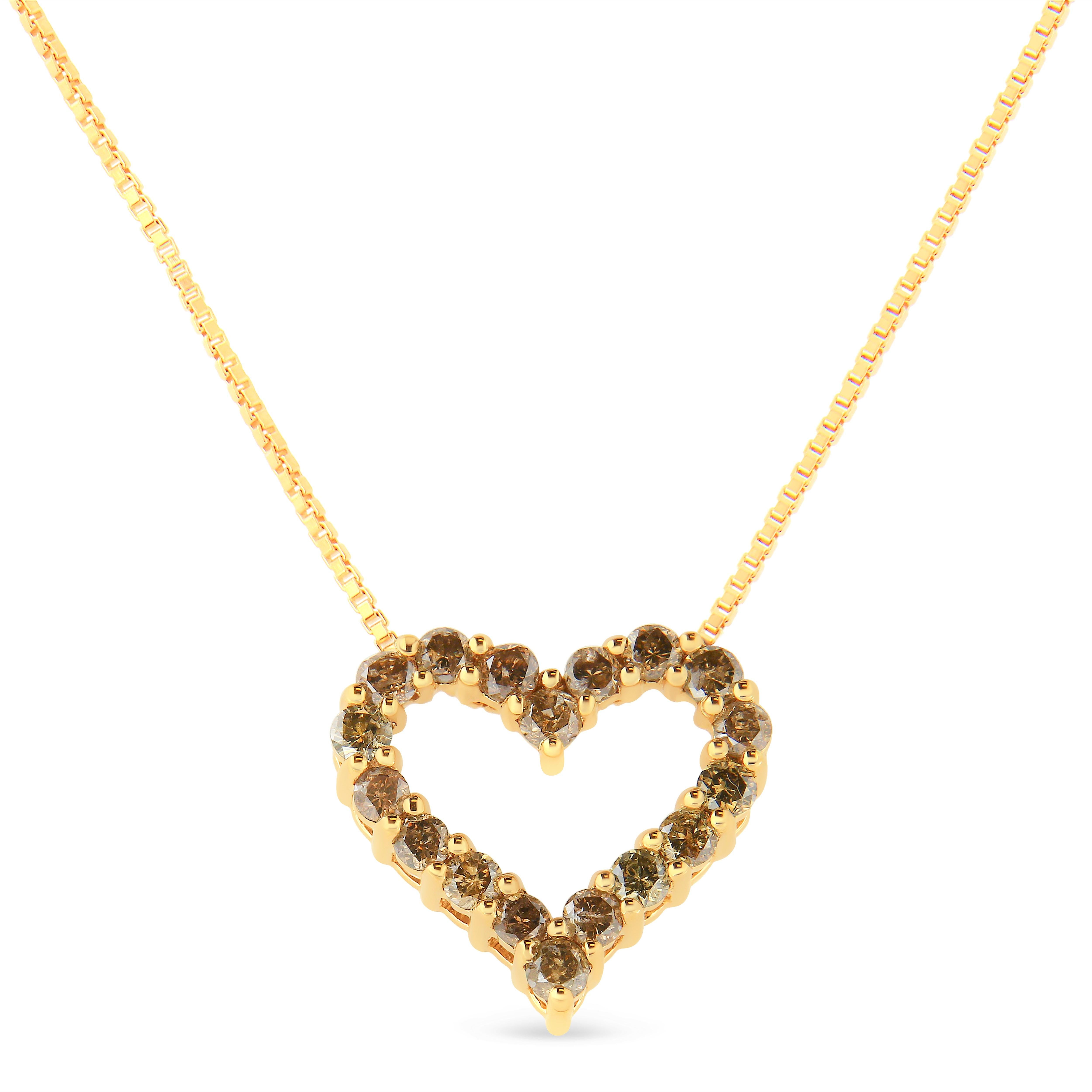 Adorn yourself with this lovely 14kt yellow gold plated 925 sterling silver heart pendant necklace. This elegant necklace is embellished with 18 round cut champagne color diamonds in classic shared prong settings. The pendant features a total