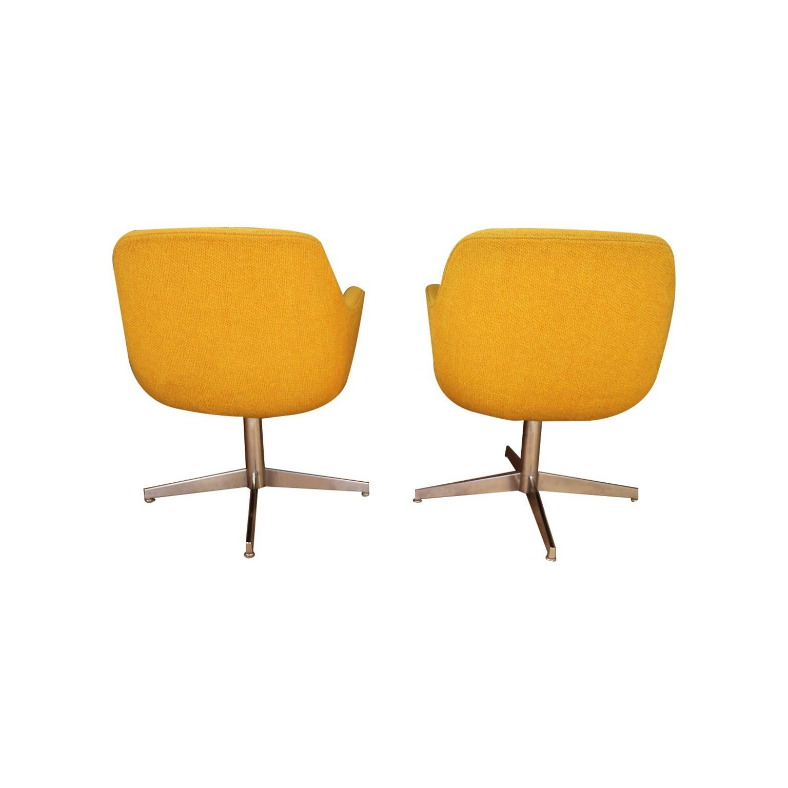 yellow swivel barrel chair