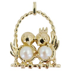 Yellow Gold Pair of Pearl Birds on a Swing Pendant