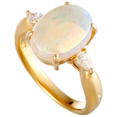 Yellow Gold Pear Diamond and Opal Oval Ring