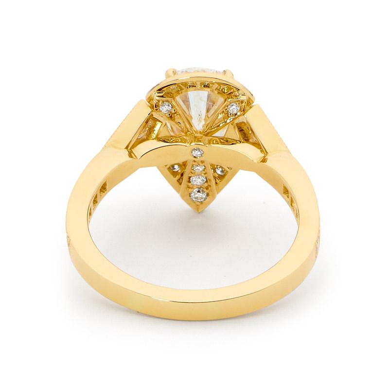 yellow gold pear shaped engagement rings