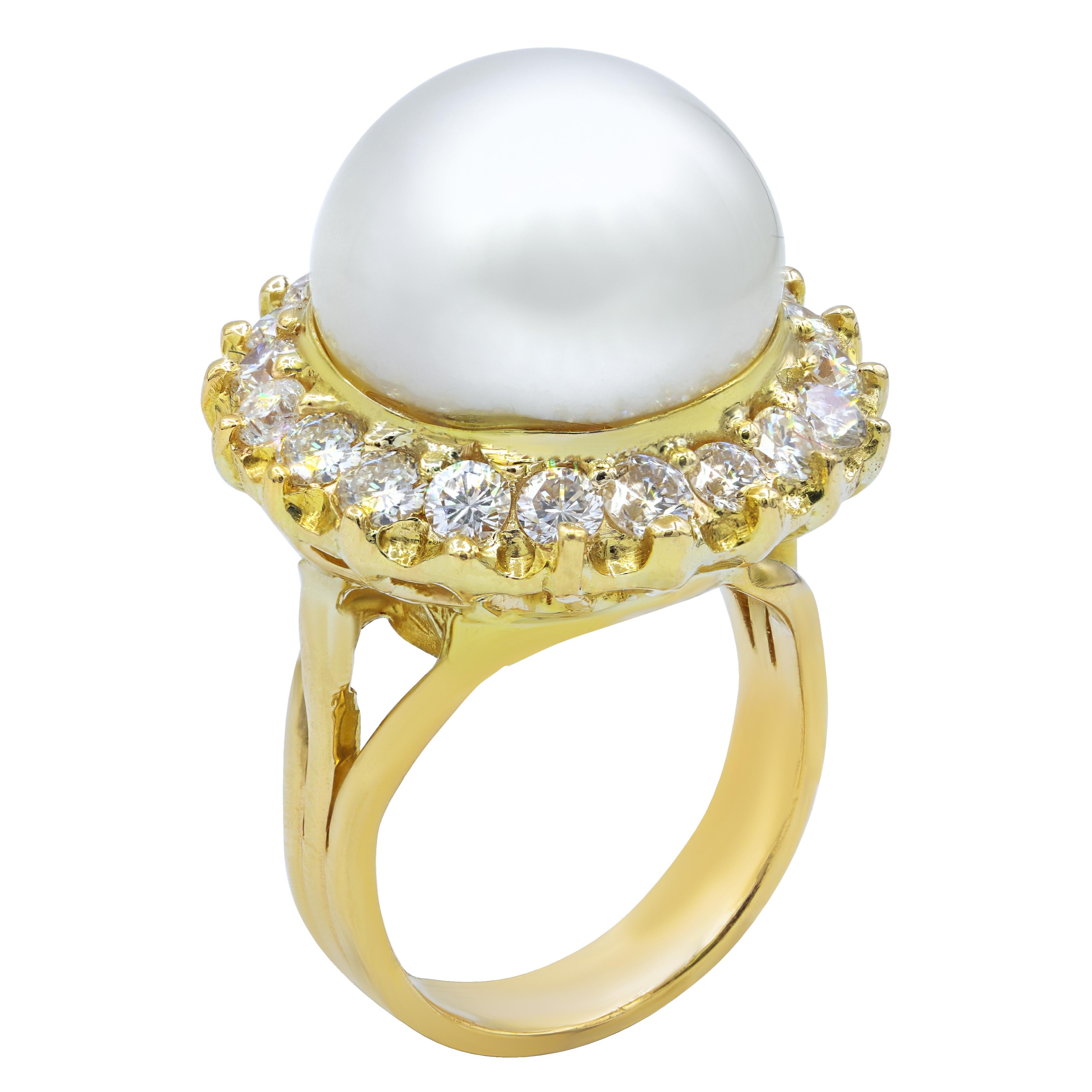 14KT yellow gold pearl and diamond ring, features 14mm white pearl with 1.80 carats of diamonds in a halo.