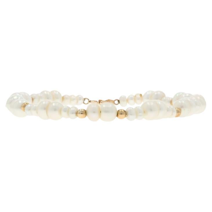 Bracelet en or jaune avec perles 7 1/2" - 14k