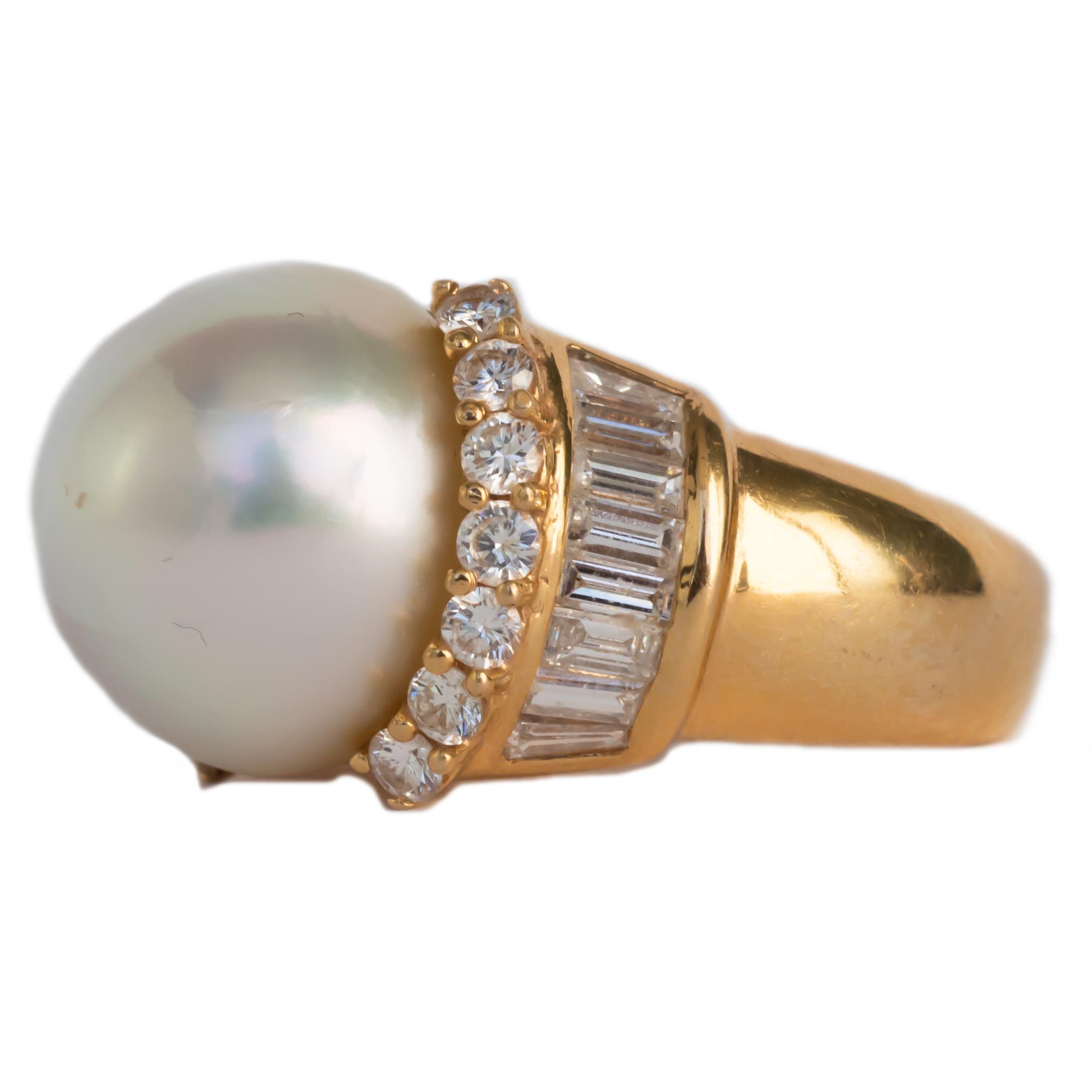 Item Details: 
Ring Size: 5
Metal Type: 18 karat Yellow Gold 
Weight: 13.0 grams

Center Diamond Details
GIA CERTIFIED Center Diamond
Shape: Natural Pearl
Dimensions: 14mm

Side Stone Details: 
Shape: Baguette and Round Diamonds 
Total Carat Weight: