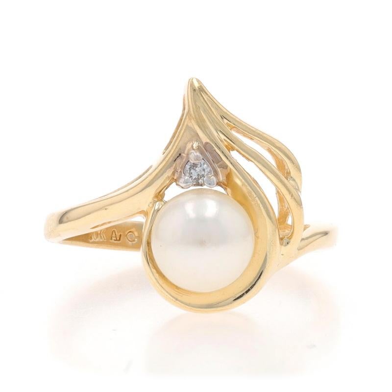 Size: 6 1/2
Sizing Fee: Up 2 sizes for $35 or Down 1 size for $35

Metal Content: 10k Yellow Gold & 10k White Gold

Stone Information

Cultured Pearl

Natural Diamond
Carat(s): .02ct
Cut: Round Brilliant
Color: G
Clarity: SI2

Style: Bypass,
