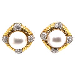 Boucle d'oreille en or jaune avec perles et diamants