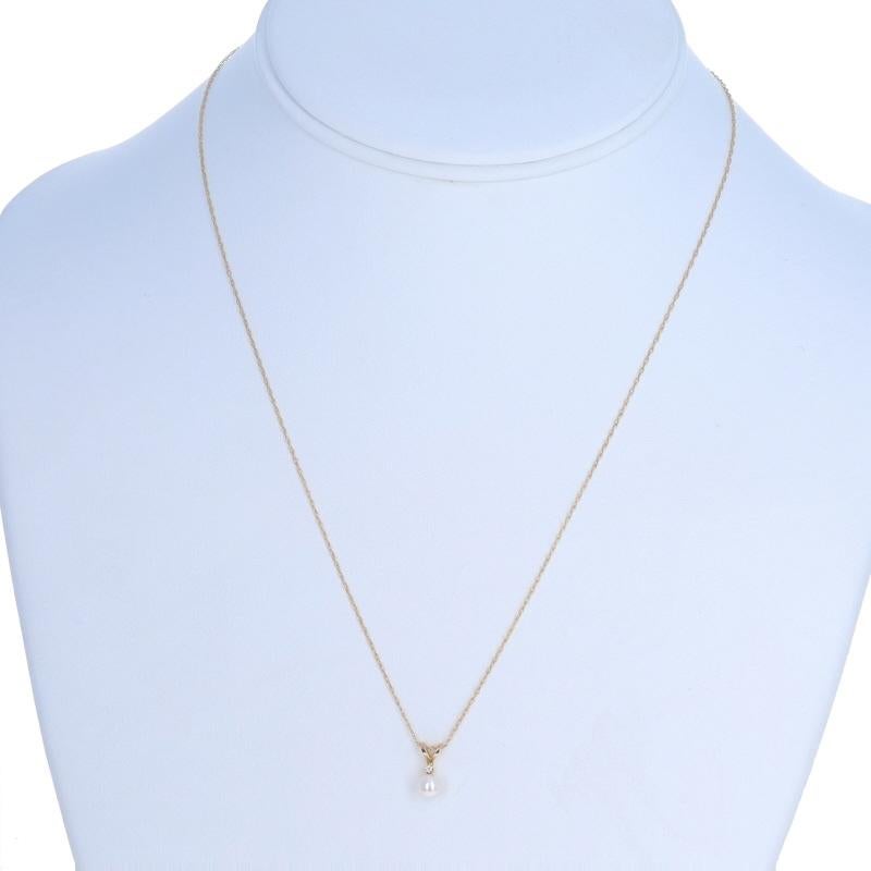 Perle Collier pendentif en or jaune avec perles et diamants 18