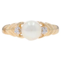 Bague en or jaune avec perles et diamants - 10k 2.00