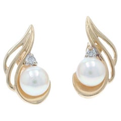 Boucles d
oreilles or jaune perle diamant - 10k Swirl Pierced