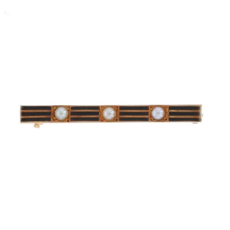Era: Edwardian
Date: 1900s - 1910s

Metal Content: 14k Yellow Gold

Stone Information
Natural Pearls

Material Information
Enamel
Color: Black

Style: Petite Three-Stone Bar Brooch
Fastening Type: Hinged Pin and Locking C-Clasp
Theme: