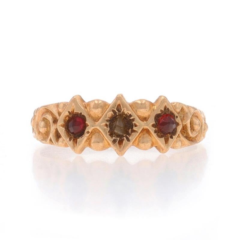 Size: 1/2

Era: Victorian
Date: 1870s - 1890s

Metal Content: 10k Yellow Gold

Stone Information
Cultured Pearl
Cut: Seed

Natural Garnets
Cut: Round Point
Color: Red

Style: Three-Stone
Theme: Starburst Swirl

Measurements
Face Height (north to