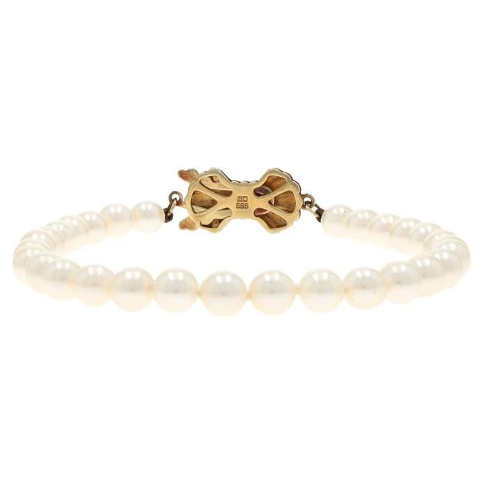 Yellow Gold Pearl Knotted Strand Bracelet 7" - 14k