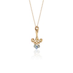 Yellow Gold Pendant Necklace with Blue Sapphire Teardrops and Canary Diamonds