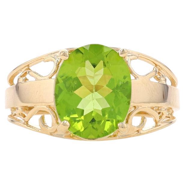 Yellow Gold Peridot Cocktail Solitaire Ring - 10k Oval 3.05ct For Sale
