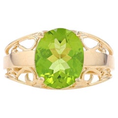 Bague cocktail solitaire en or jaune 10 carats avec péridot ovale 3,05 carats