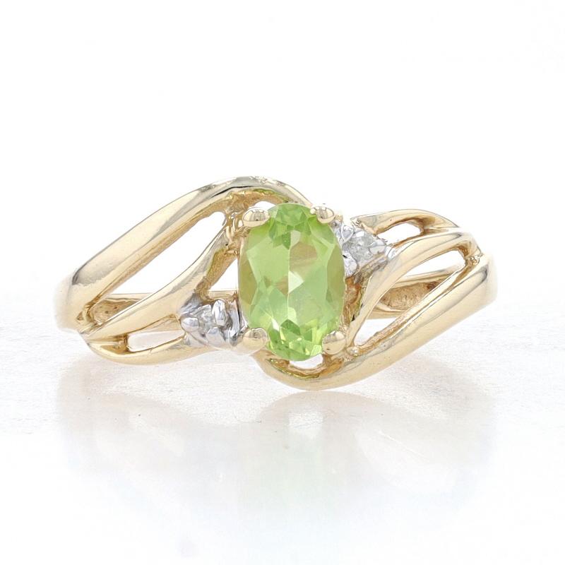 Size: 4 1/4
Sizing Fee: Up 2 sizes for $35 or Down 2 sizes for $30

Metal Content: 10k Yellow Gold & 10k White Gold

Stone Information

Natural Peridot
Carat(s): .50ct
Cut: Oval
Color: Green

Natural Diamonds
Cut: Single
Stone Note: (two small