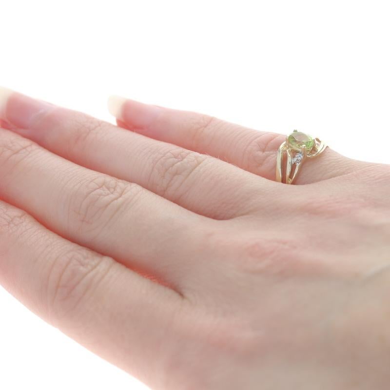 Women's Yellow Gold Peridot & Diamond Bypass Ring - 10k Oval .50ct For Sale