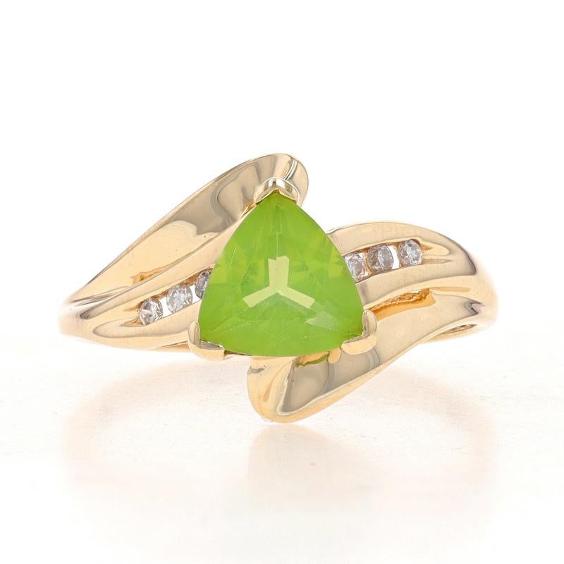Size: 7
Sizing Fee: Up 3 sizes for $30 or Down 2 sizes for $25

Metal Content: 10k Yellow Gold

Stone Information
Natural Peridot
Carat(s): .96ct
Cut: Trillion
Color: Green

Natural Diamonds
Carat(s): .06ctw
Cut: Round Brilliant
Color: H -