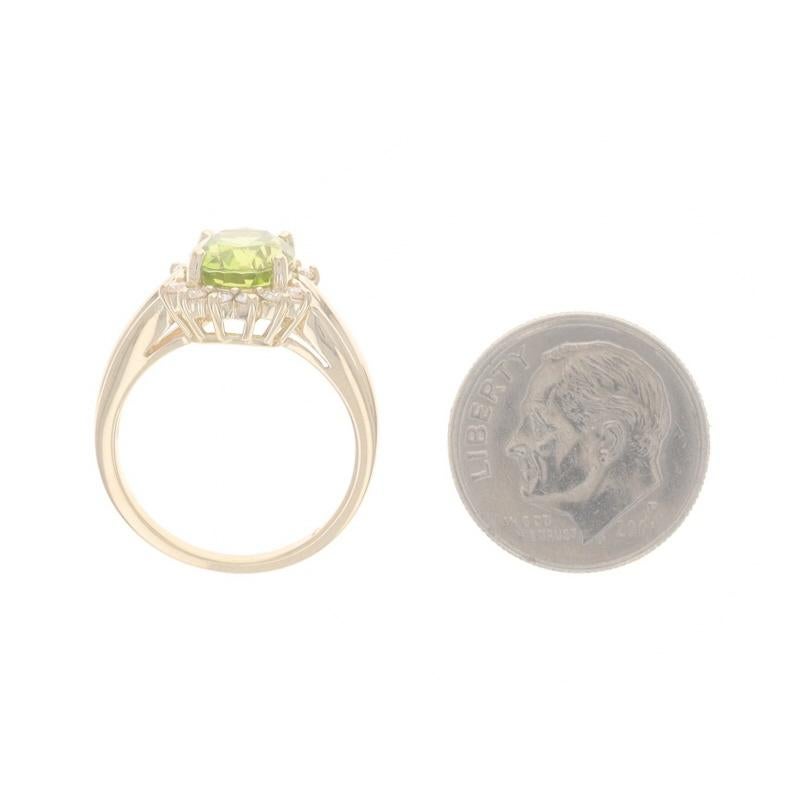 Bague en or jaune 14 carats avec péridot ovale 2,21 carats en vente 1