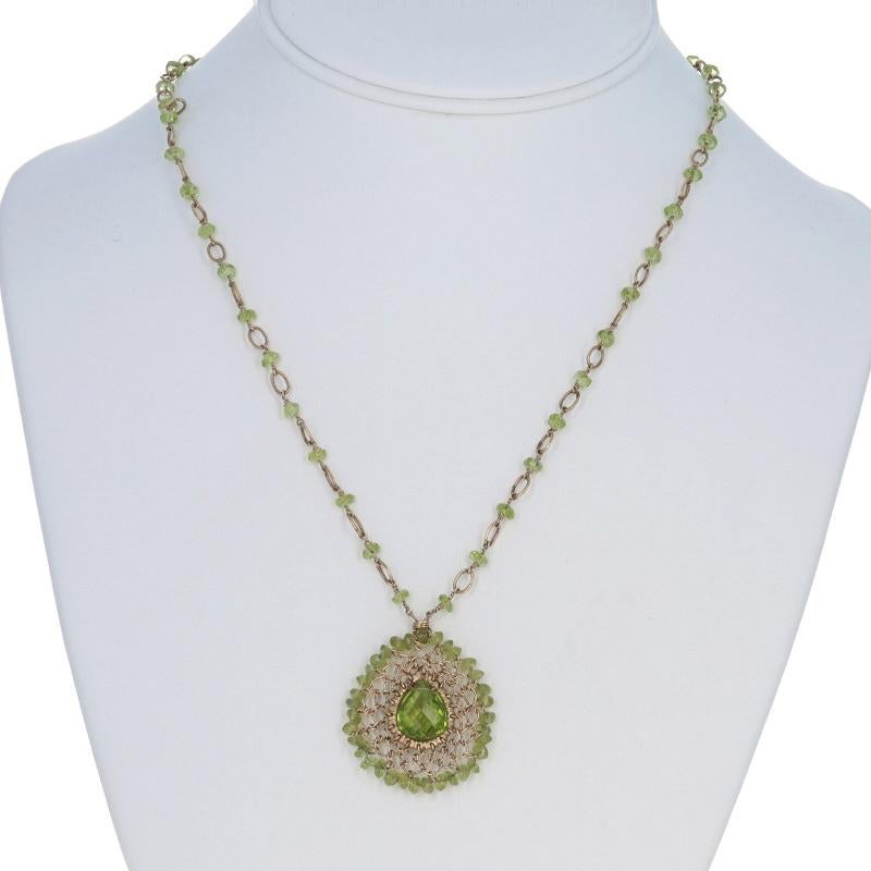 Collana aureola in oro giallo con peridoto da 19