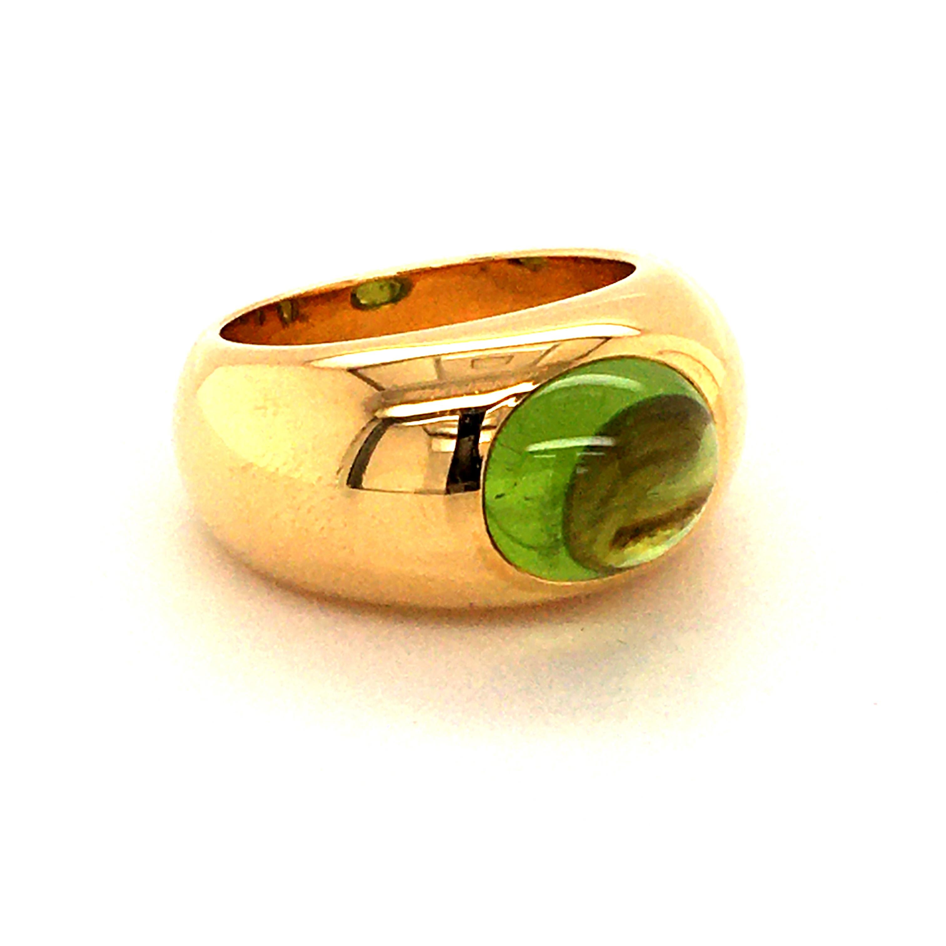 This timeless ring is made by Swiss Jeweller Bucherer in yellow gold 750 and set with 1 oval cabochon cut peridot of approx. 5 ct.

Please, ask for additional pictures if you are interested in this item.

Weight: 25.12 grams
Ring Size: 53 / US 6.4