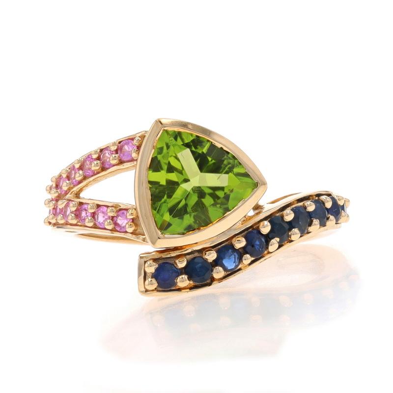 Size: 7 1/4
Sizing Fee: Up 1 size for $35 or Down 1/2 a size for $35

Metal Content: 10k Yellow Gold

Stone Information
Natural Peridot
Carat(s): 1.33ct
Cut: Trillion
Color: Green

Natural Sapphires
Treatment: Heating
Carat(s): .45ctw
Cut: