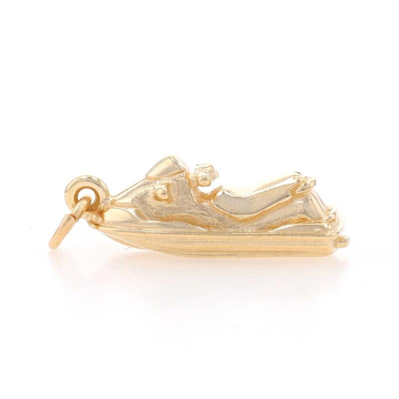Metal Content: 14k Yellow Gold

Theme: Personal Watercraft, Aquatic Recreational Vehicle

Measurements

Tall (from stationary bail): 27/32