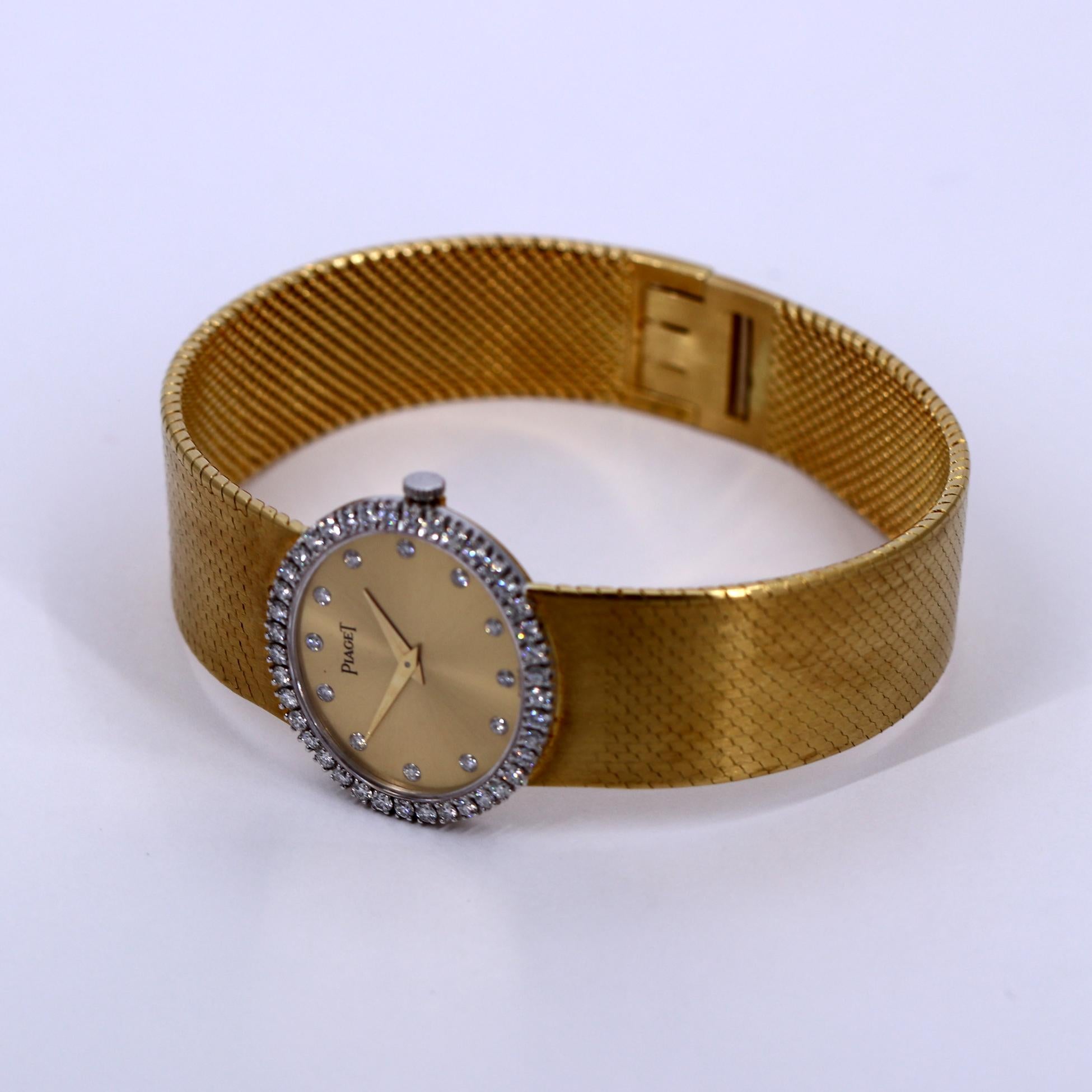 gold watch with diamond bezel