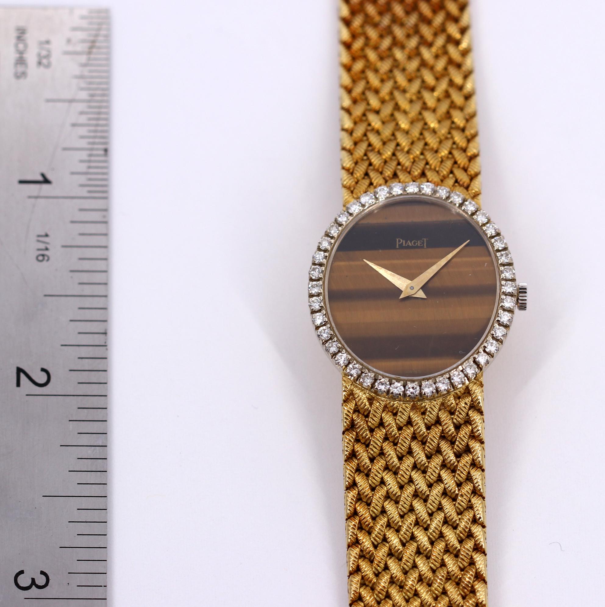 Yellow Gold Piaget Watch with Diamond Bezel and Oval Tiger's Eye Dial 1