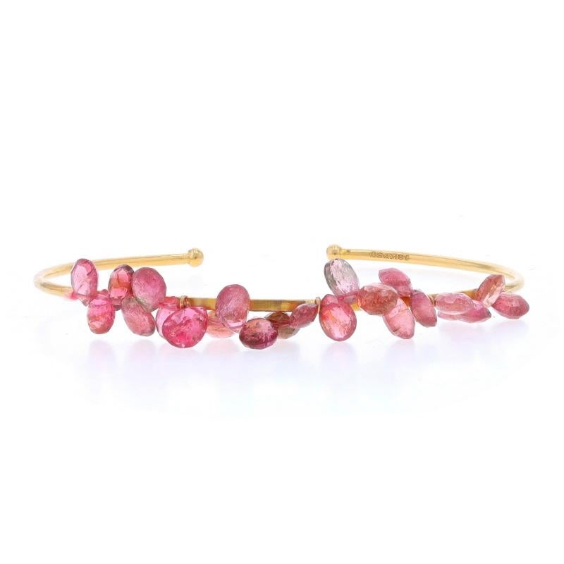 Metal Content: 18k Yellow Gold

Stone Information
Natural Pink Tourmalines
Cut: Briolette

Style: Cuff
Fastening Type: N/A (slides over wrist)
Features: Matte Finish

Measurements
Inner circumference (including the opening): 7 1/4