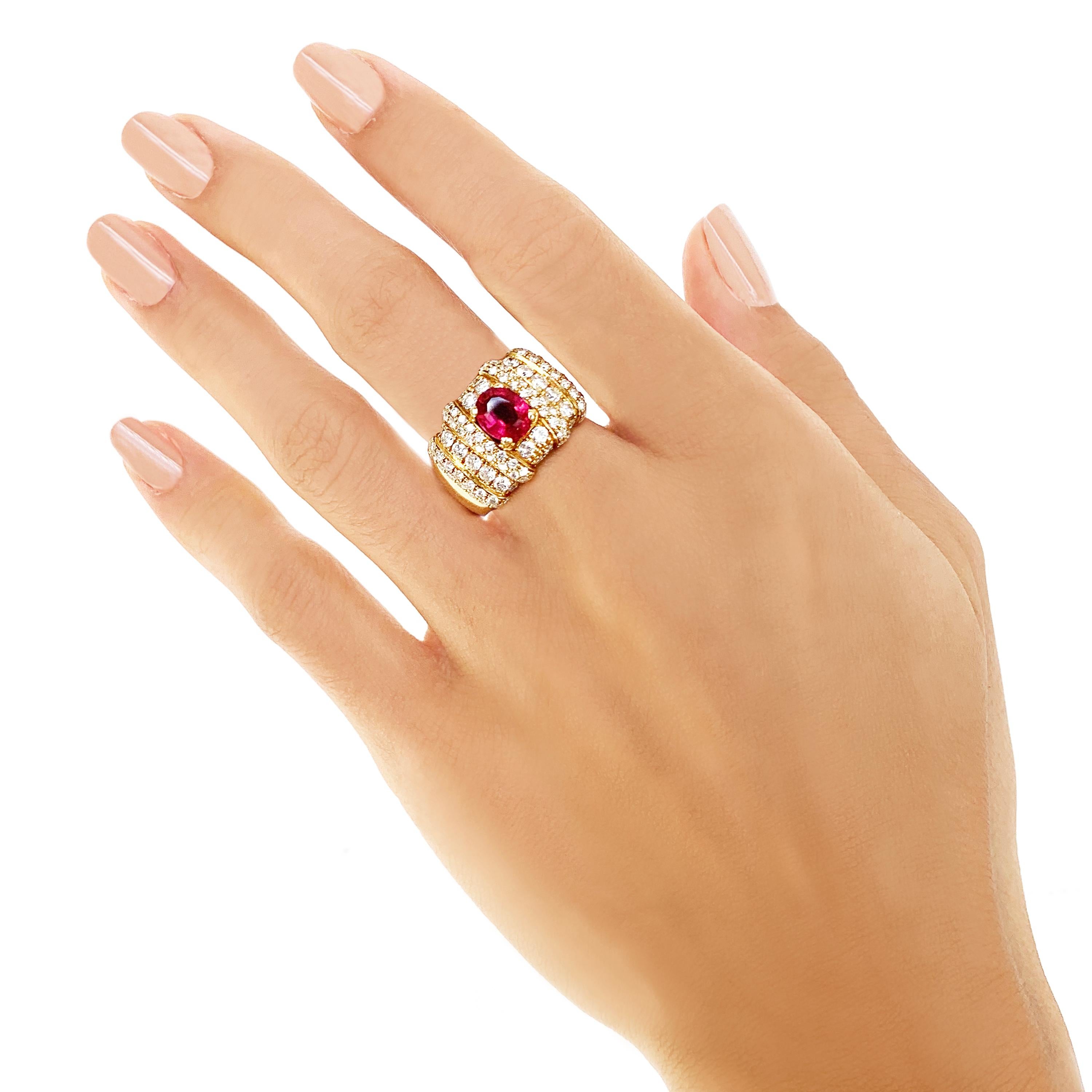 A Rosior by Manuel Rosas 19.2K yellow gold ring set with:
- 1 oval cut red tourmaline (rubilite) with 1,45 ct,
- 96 diamonds with 1,66 ct. 
This unique piece comes with a Certificate of Authenticity. 
Stamps include the Rosior hallmark and 19.2K