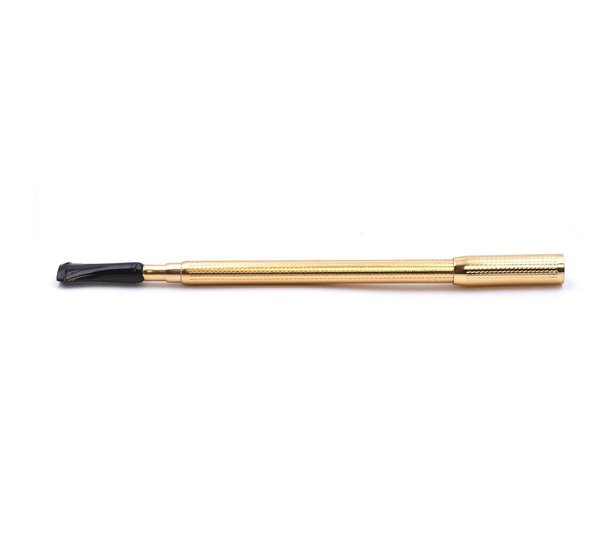 Designer: custom
Dimensions: filter extends to 11.5-inches

Material: yellow gold plated 
