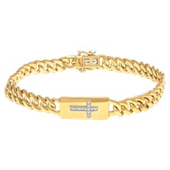 Pulsera de eslabones cubanos con incrustaciones de cruces en plata chapada en oro amarillo con detalles de diamantes