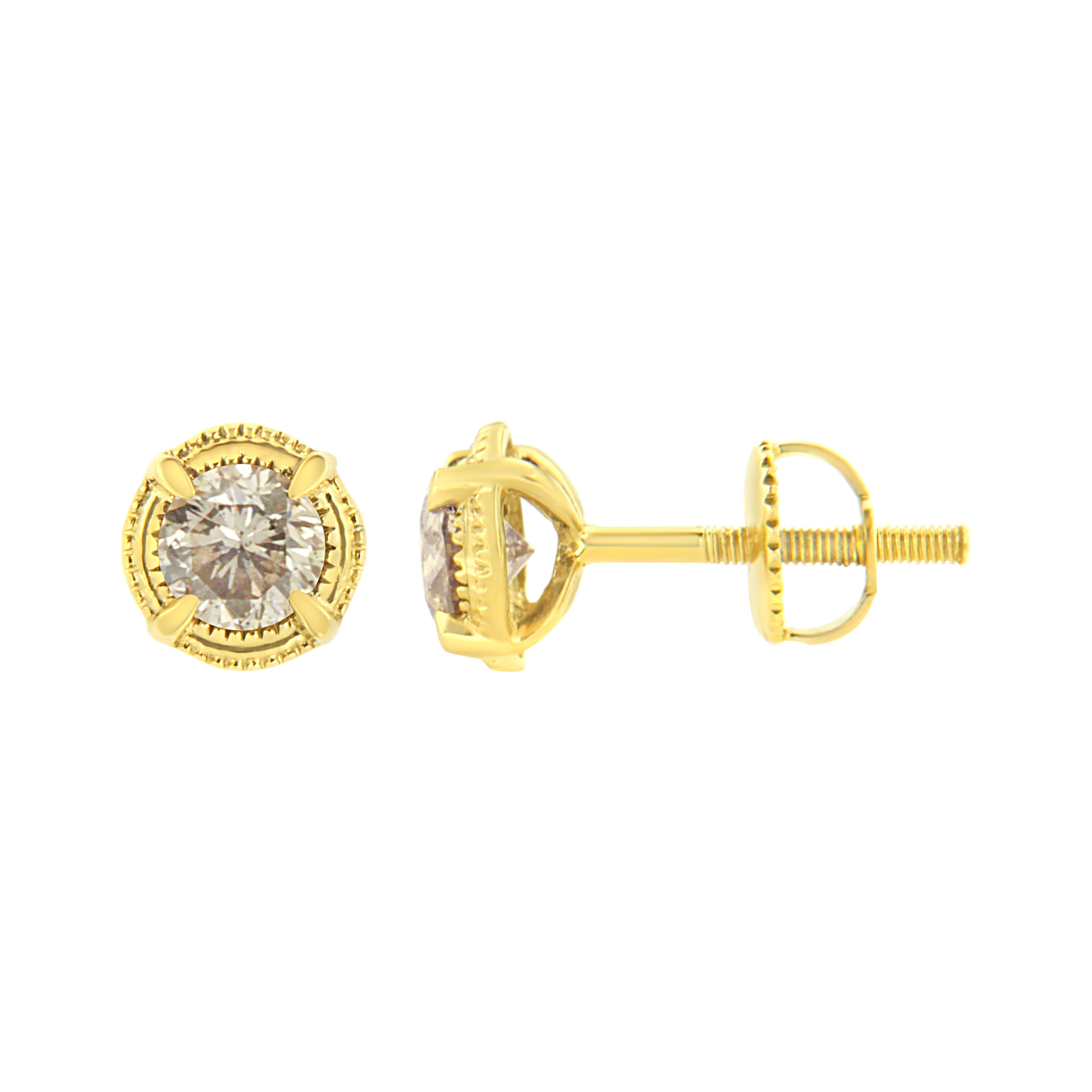 Delicate milgrain texture traces the edge of these stunning earrings crafted of genuine 14k Yellow gold plated .925 sterling silver. Diamonds are set at the center of the 4-prong design of each of these round stud earrings. A screw back keeps these