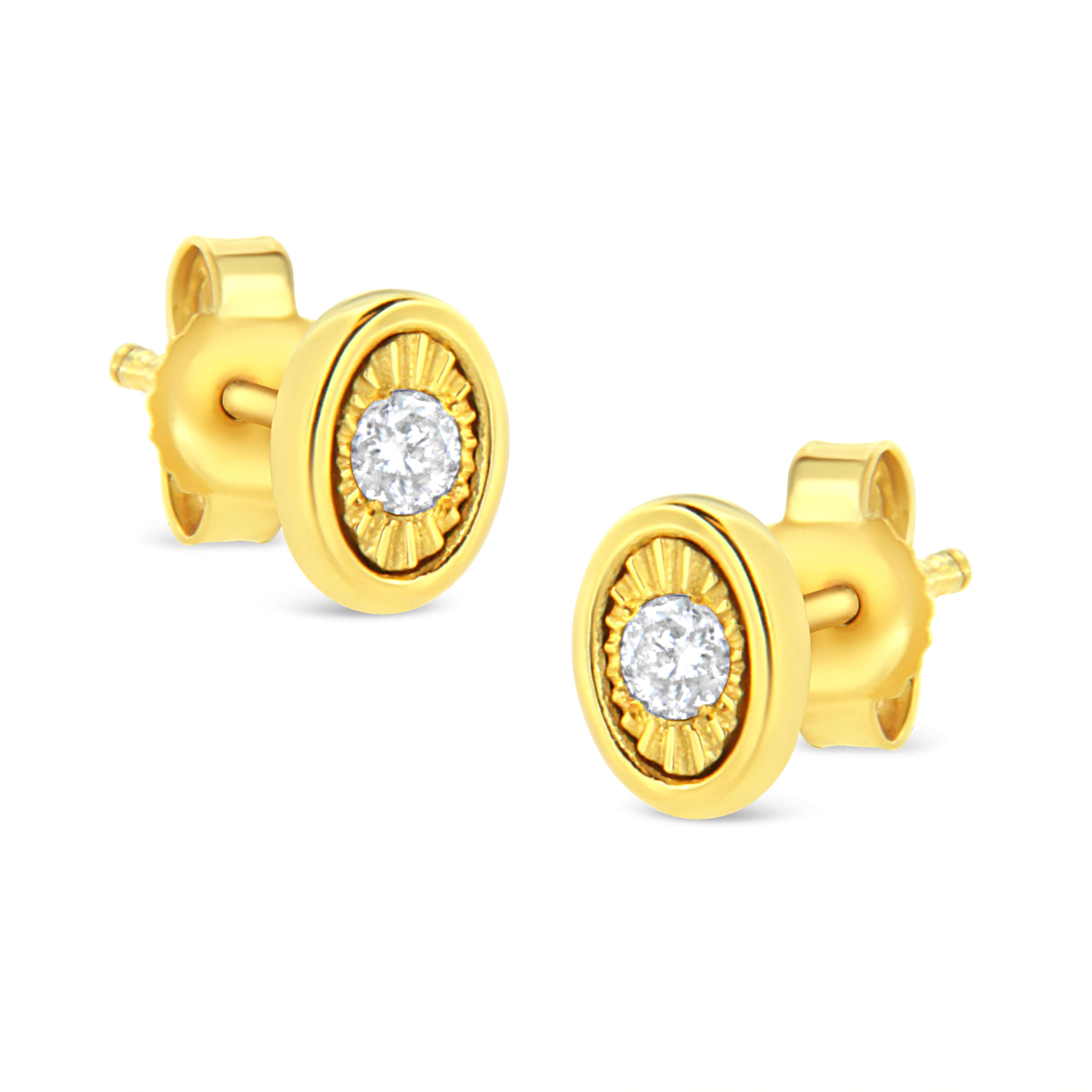 These oval shaped stud earrings are crafted in 10k yellow gold plated sterling silver and feature 1/10ct TDW of diamonds. Each earring features a single sparkling round cut diamond in a miracle setting that adds to the earrings sparkle. A polished