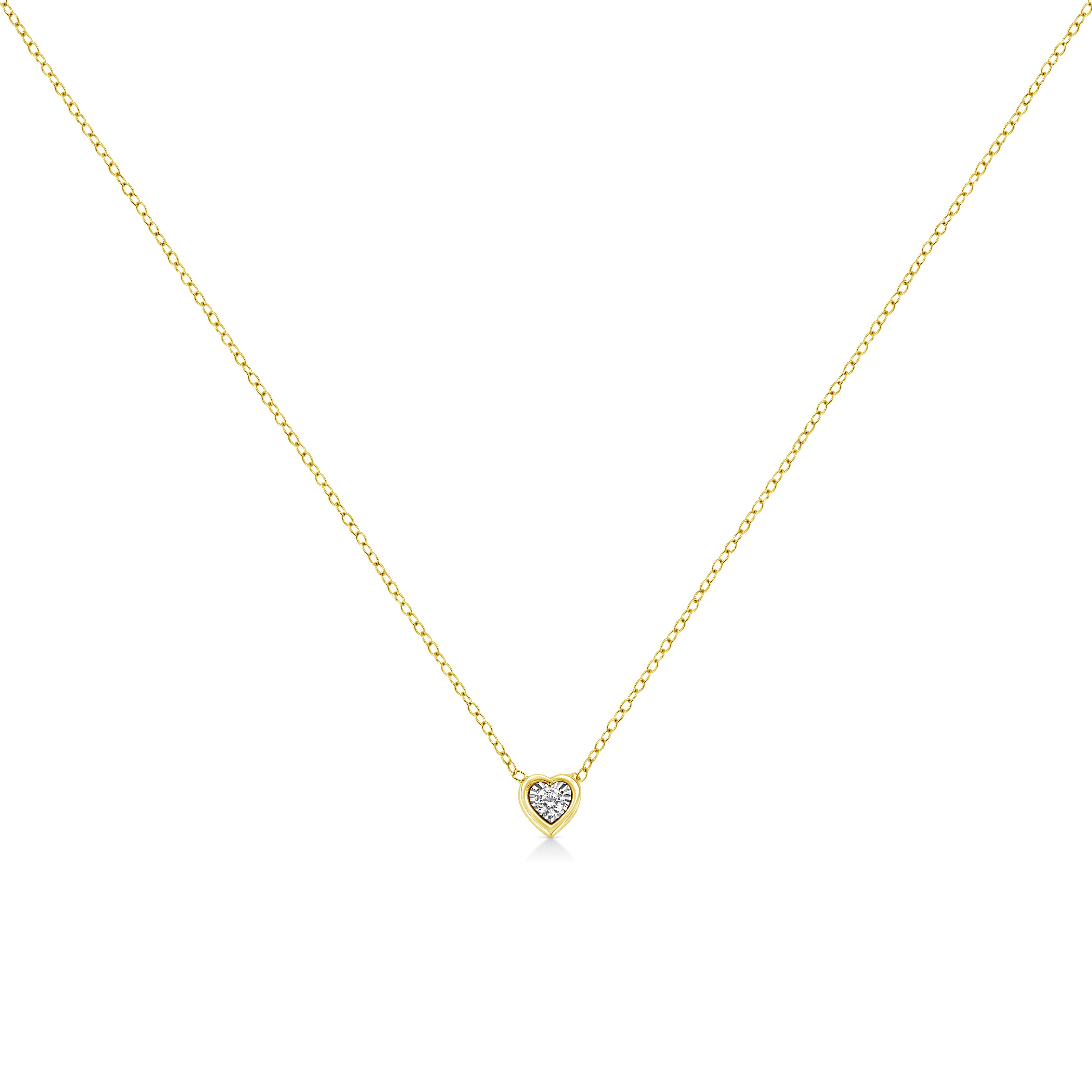Haven’t we all had the dream of getting ready like a queen for that special day. This heart shaped diamond pendant necklace is designed for that queen in you. This 10k Yellow Gold Plated .925 Sterling SIlver pendant is studded with a single 1/10