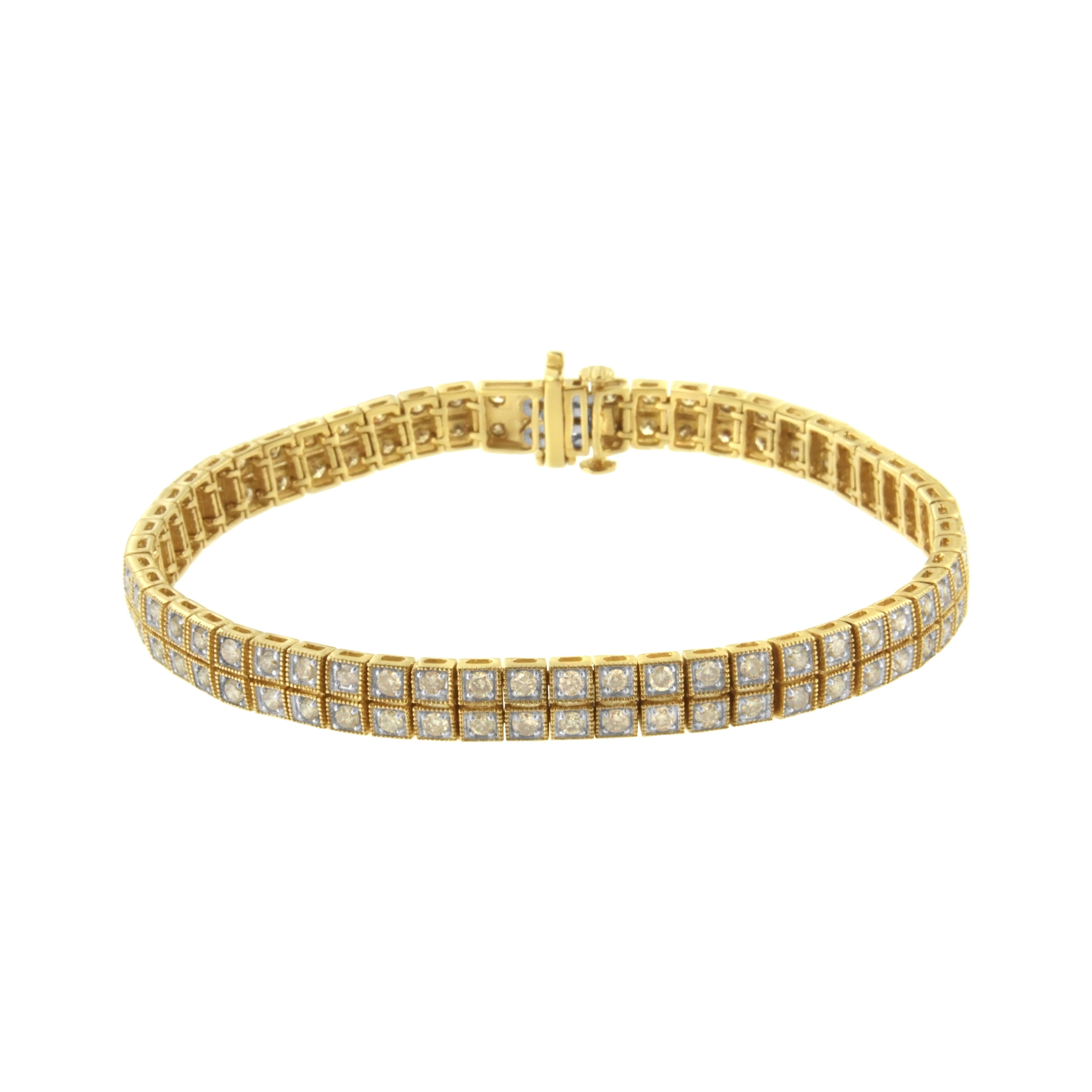 This classic twist on the diamond tennis bracelet is meant to go with you everywhere. The always-in-fashion tennis bracelet presents 112 round-cut, natural, sparkling diamonds set in warm 14k Yellow Gold Plated Sterling Silver with decorative