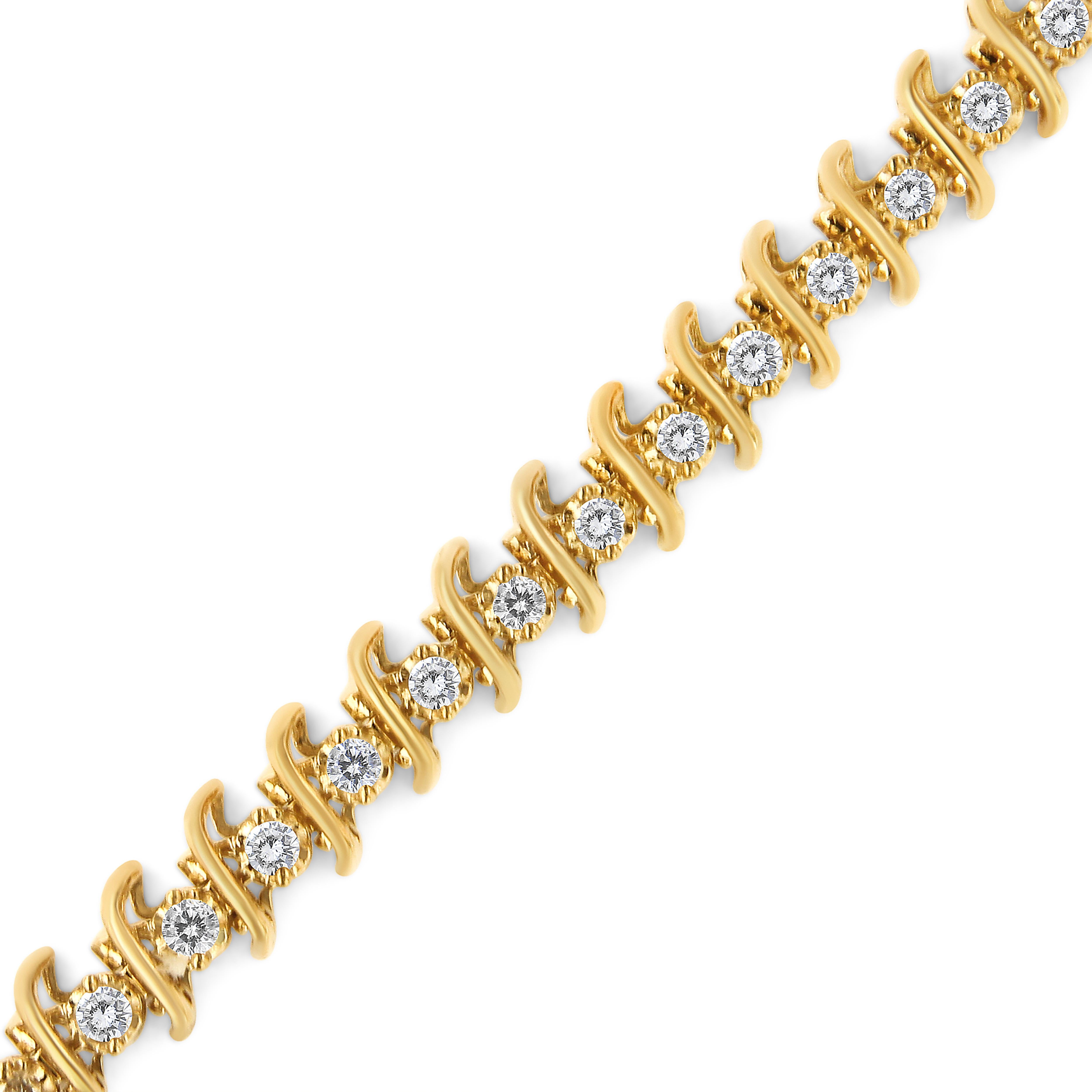 A lovely piece for a formal occasion, this 10k yellow gold plated .925 sterling silver bracelet will become your go-to for any event where you want to impress. This piece is uniquely designed with gold 