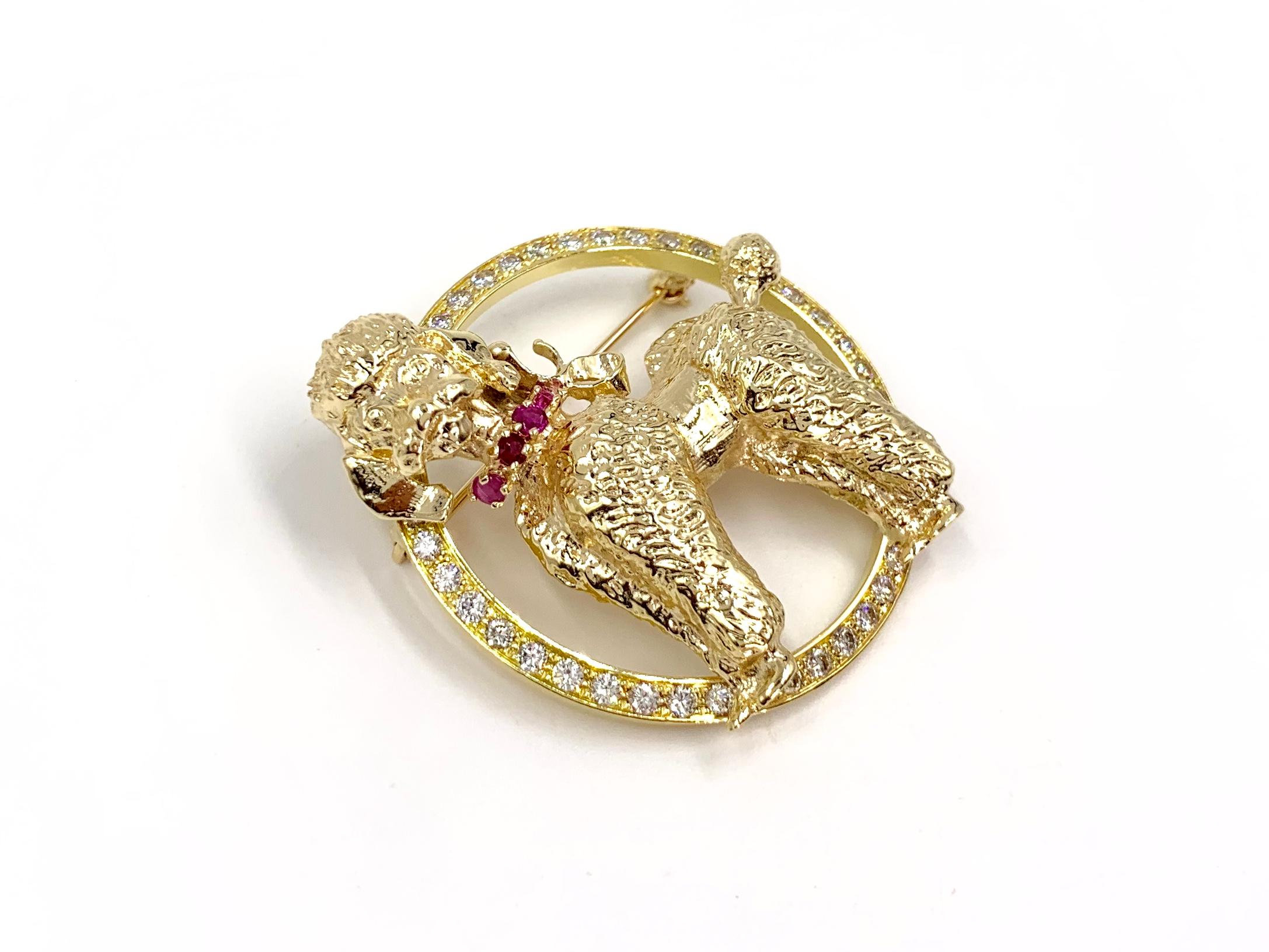 An adorable vintage poodle dog brooch. This 14 karat yellow gold poodle is doting a ruby collar within a white diamond circle. Approximate diamond weight is .75 carats at approximately G color, VS2 clarity. Diameter of circle is 35mm (just shy of